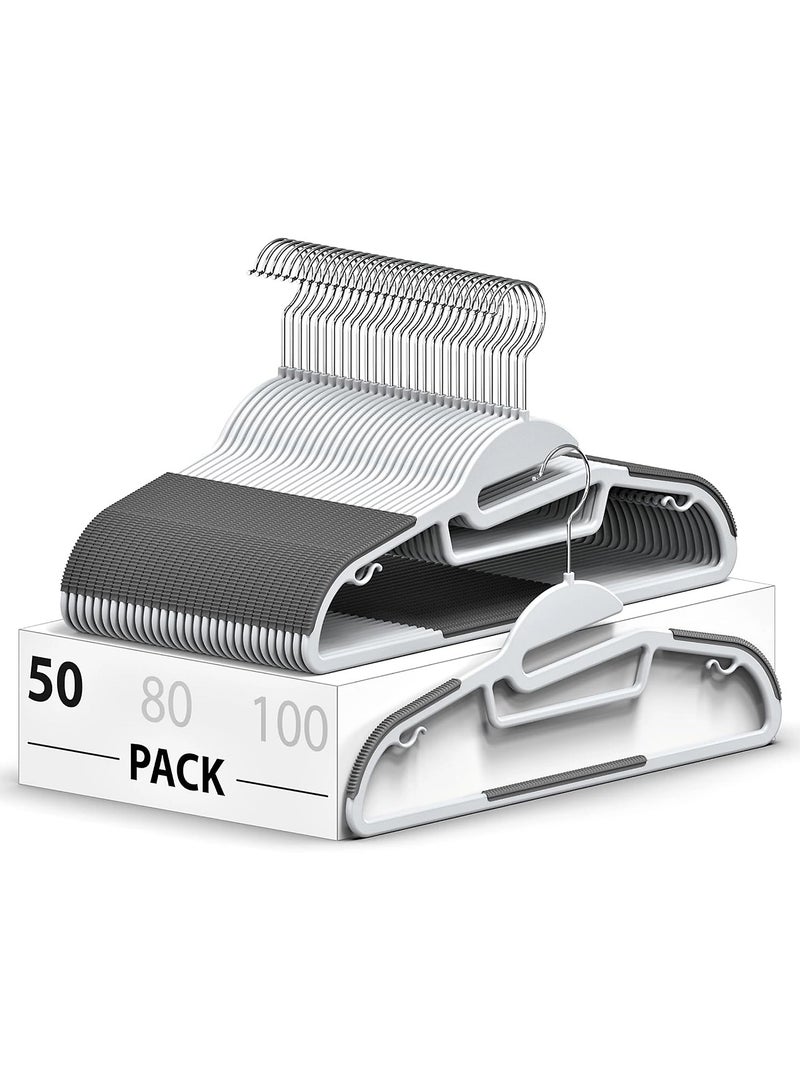 KITCHENOO Set of 50 plastic clothes hangers, sturdy clothes hangers with non-slip pads, easy-glide space-saving organizer for bedroom closet, ideal for shirts and pants, white - Image 1